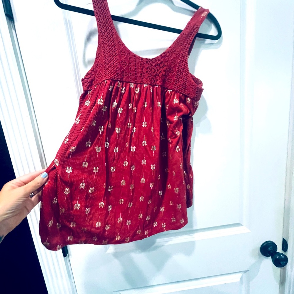 Maroon shirt w/ gold detailing